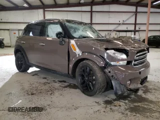 2015 MINI Countryman with VIN WMWZB3C52FWR44105, listed as a Copart auction lot 86780484 with Not Provided miles and Salvage Title. Bid and sale history available at DreamBid. Image 4.