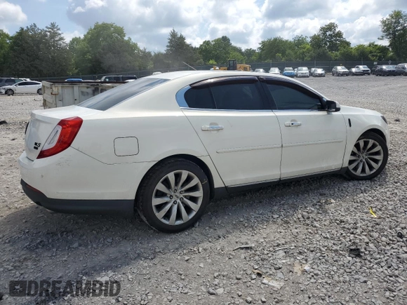 2013 Lincoln MKS with VIN 1LNHL9EK8DG605675, listed as a Copart auction lot 62448455 with 102,642 mi miles and Salvage title. Bid and sale history available at DreamBid. Image 3.