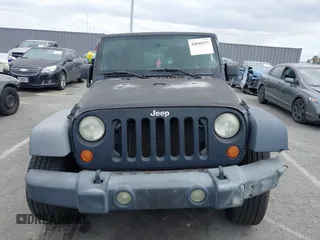 2007 Jeep Wrangler Unlimited X with VIN 1J4GB391X7L172965, listed as a IAAI auction lot 42040337 with 170,482 mi miles and . Bid and sale history available at DreamBid. Image 12.