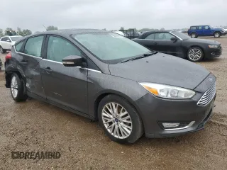 2018 Ford Focus Titanium z VIN 1FADP3N21JL295883, wystawiony jako Copart lot #59051015 z przebiegiem 43 284 mil mil oraz Szkoda całkowita • Salvage title. Historia ofert i sprzedaży dostępna na DreamBid. Obrazek 4.