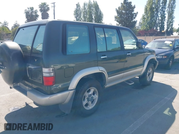 2002 Isuzu Trooper S z VIN JACDJ58X427J08532, wystawiony jako IAAI lot #42228494 z przebiegiem Nie podano mil oraz . Historia ofert i sprzedaży dostępna na DreamBid. Obrazek 4.