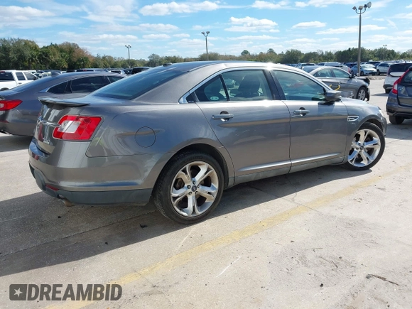 2011 Ford Taurus SHO with VIN 1FAHP2KT6BG167447, listed as a IAAI auction lot 41433934 with 201,600 mi miles and . Bid and sale history available at DreamBid. Image 4.