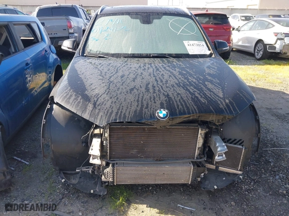 2018 BMW X1 sDrive28i with VIN WBXHU7C39J5L07129, listed as a IAAI auction lot 41472014 with 56,486 mi miles. Bid and sale history available at carsss.com. Image 13.