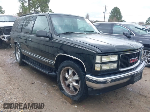 1998 GMC Yukon with VIN 1GKEC13R8WJ711255, listed as a IAAI auction lot 41457304 with 291,211 mi miles. Bid and sale history available at carsss.com. Image 1.