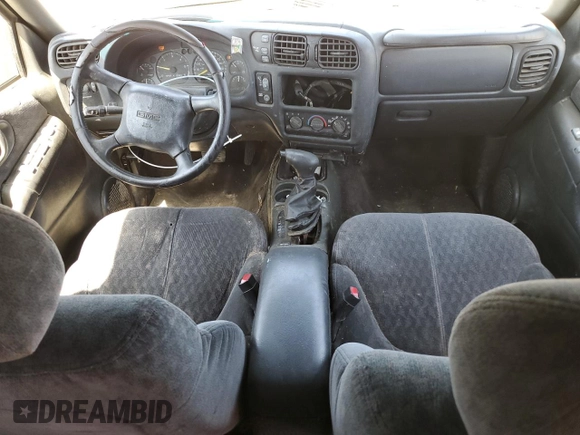 2001 GMC Jimmy SLE Rental Fleet z VIN 1GKDT13W212108144, wystawiony jako Copart lot #58753865 z przebiegiem 254 402 mil mil oraz Szkoda całkowita • Salvage title. Historia ofert i sprzedaży dostępna na DreamBid. Obrazek 8.