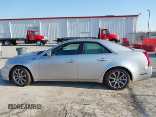 2009 Cadillac CTS RWD with VIN 1G6DV57V590125951, listed as a IAAI auction lot 42005788 with 160,133 mi miles and . Bid and sale history available at carsss.com. Image 14.