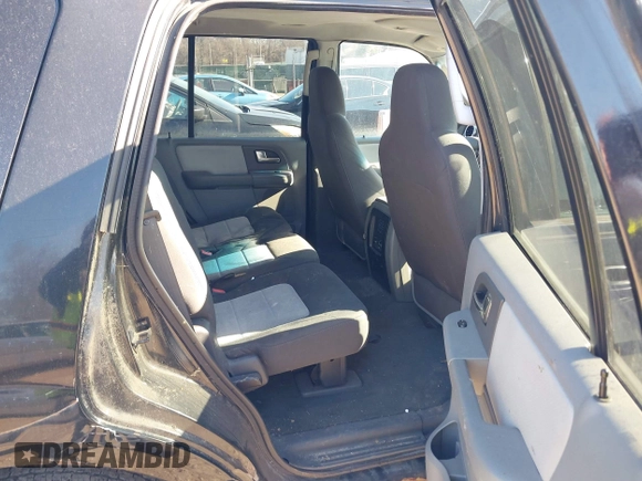 2004 Ford Expedition XLT with VIN 1FMPU16WX4LB12891, listed as a IAAI auction lot 41695636 with 209,574 mi miles. Bid and sale history available at carsss.com. Image 8.