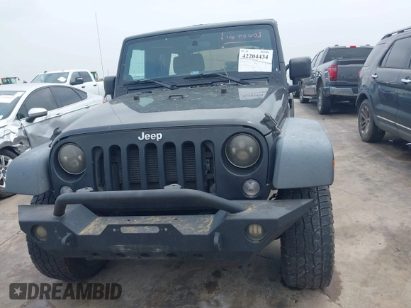 2014 Jeep Wrangler Unlimited Sport with VIN 1C4BJWDG0EL290441, listed as a IAAI auction lot 42204434 with 138,367 mi miles and . Bid and sale history available at DreamBid. Image 12.