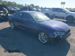 2023 Audi A4 S line Premium Plus with VIN WAUEAAF4XPN010449, listed as a IAAI auction lot 41974891 with 58,070 mi miles and . Bid and sale history available at DreamBid. Image 1.