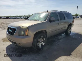 2007 GMC Yukon XL SLT z VIN 1GKFK16387J173009, wystawiony jako Copart lot #54010965 z przebiegiem 264 446 mil mil oraz Tytuł czysty. Historia ofert i sprzedaży dostępna na DreamBid. Obrazek 1.