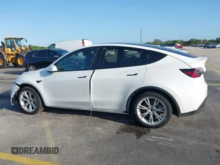 2021 Tesla Model Y Standard Range with VIN 5YJYGDED3MF103650, listed as a IAAI auction lot 41726278 with Not Provided miles and . Bid and sale history available at DreamBid. Image 13.