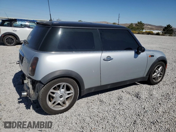 2002 MINI Hardtop with VIN WMWRC33472TC34281, listed as a Copart auction lot 71631644 with 196,947 mi miles and Salvage Title. Bid and sale history available at DreamBid. Image 3.