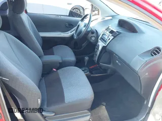 2009 Toyota Yaris with VIN JTDJT903695234623, listed as a IAAI auction lot 42027852 with 146,000 mi miles. Bid and sale history available at carsss.com. Image 5.