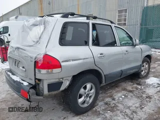 2005 Hyundai Santa Fe GLS z VIN KM8SC73D35U912897, wystawiony jako IAAI lot #41401372 z przebiegiem 260 843 mil mil oraz . Historia ofert i sprzedaży dostępna na DreamBid. Obrazek 4.