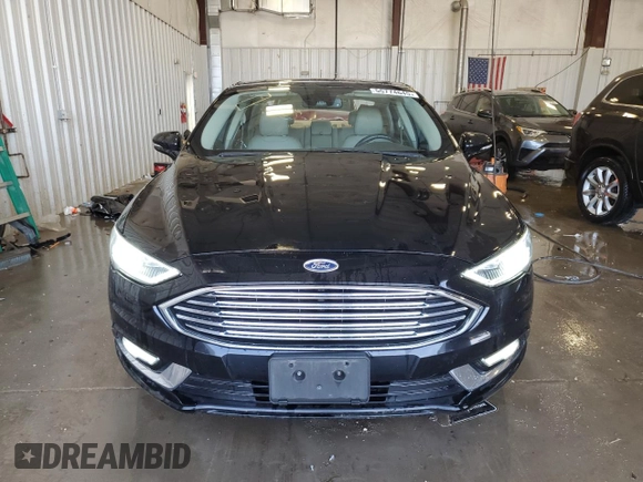 2017 Ford Fusion SE z VIN 3FA6P0H9XHR119202, wystawiony jako Copart lot #55774645 z przebiegiem 93 525 mil mil oraz Nie do naprawy • Non repairable. Historia ofert i sprzedaży dostępna na DreamBid. Obrazek 5.