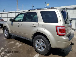 2010 Ford Escape Limited z VIN 1FMCU9EG5AKC49732, wystawiony jako Copart lot #61172415 z przebiegiem 148 796 mil mil oraz Szkoda całkowita • Salvage title. Historia ofert i sprzedaży dostępna na DreamBid. Obrazek 2.