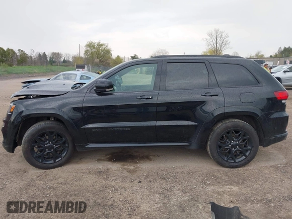 2021 Jeep Grand Cherokee 80th Anniversary with VIN 1C4RJFBG7MC828116, listed as a IAAI auction lot 42118355 with 57,240 mi miles and . Bid and sale history available at DreamBid. Image 15.