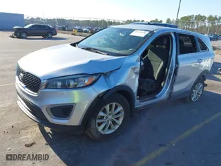 2016 Kia Sorento LX with VIN 5XYPG4A39GG117980, listed as a IAAI auction lot 41649196 with 127,996 mi miles. Bid and sale history available at carsss.com. Image 2.