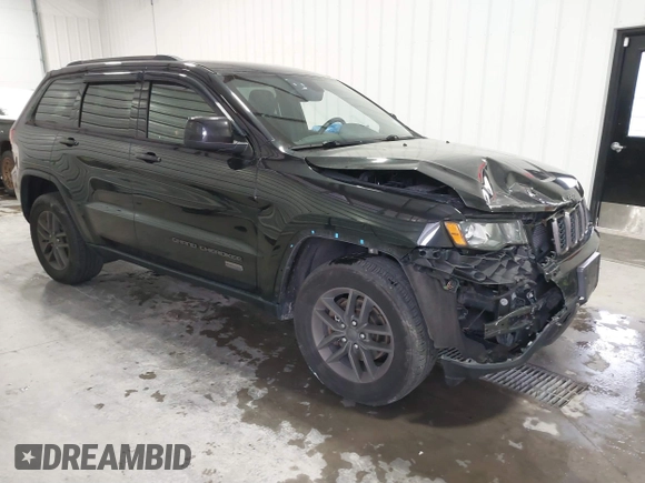 2016 Jeep Grand Cherokee 75th Anniversary z VIN 1C4RJFAG8GC476475, wystawiony jako IAAI lot #41509557 z przebiegiem 94 621 mil mil oraz . Historia ofert i sprzedaży dostępna na DreamBid. Obrazek 1.