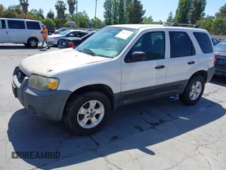 2005 Ford Escape XLT with VIN 1FMCU03195KA67225, listed as a IAAI auction lot 42614934 with 223,473 mi miles and . Bid and sale history available at DreamBid. Image 2.