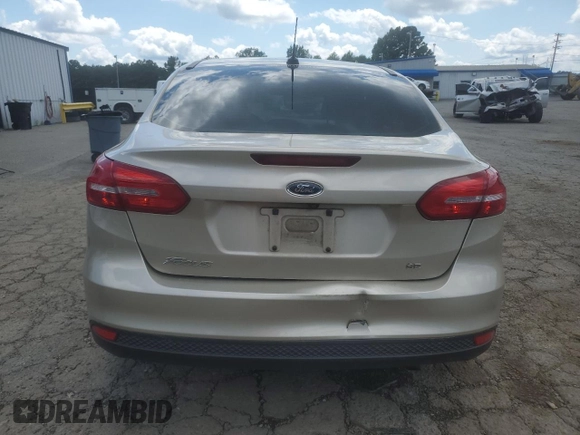 2018 Ford Focus SE with VIN 1FADP3F28JL292624, listed as a Copart auction lot 58960775 with 99,385 mi miles and Salvage title. Bid and sale history available at DreamBid. Image 6.
