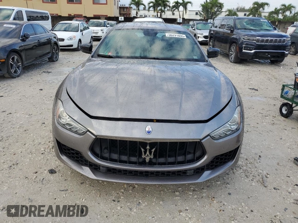 2019 Maserati Ghibli z VIN ZAM57XSA2K1328545, wystawiony jako Copart lot #56291895 z przebiegiem 53 625 mil mil oraz Tytuł czysty. Historia ofert i sprzedaży dostępna na DreamBid. Obrazek 5.