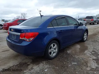 2013 Chevrolet Cruze 1LT with VIN 1G1PC5SBXD7153007, listed as a IAAI auction lot 42032884 with 180,192 mi miles. Bid and sale history available at carsss.com. Image 4.