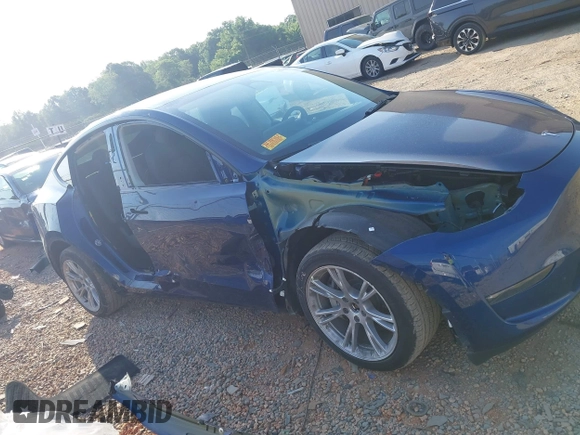 2023 Tesla Model Y Long Range with VIN 7SAYGDEE3PA114256, listed as a IAAI auction lot 42158307 with 19,975 mi miles and . Bid and sale history available at DreamBid. Image 12.