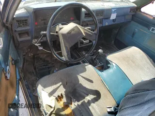 1986 Toyota Pickup с VIN JT4RN70D2G0018661, выставлен на аукционе Copart как лот 52309025 с пробегом 621 023 миль миль и Списание • Salvage title. История ставок и продаж доступна на DreamBid. Изображение 8.