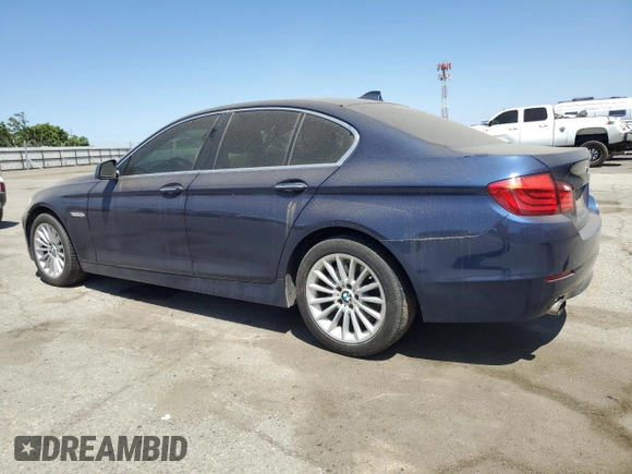 2013 BMW 5 Series 535i with VIN WBAFR7C56DC827227, listed as a Copart auction lot 50571785 with 104,128 mi miles and Clean Title. Bid and sale history available at DreamBid. Image 2.