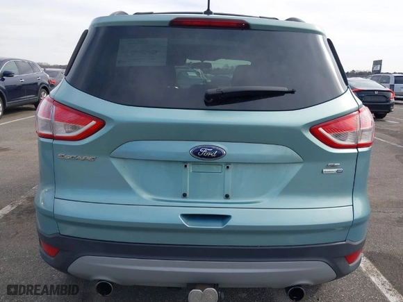 2013 Ford Escape SE with VIN 1FMCU9G96DUD33369, listed as a IAAI auction lot 41613303 with 132,657 mi miles. Bid and sale history available at carsss.com. Image 16.