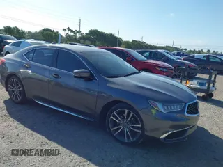 2020 Acura TLX w/Technology Pkg with VIN 19UUB2F45LA003302, listed as a IAAI auction lot 41738499 with 51,835 mi miles. Bid and sale history available at carsss.com. Image 1.