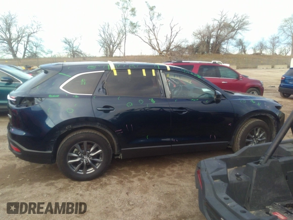 2021 Mazda CX-9 Sport with VIN JM3TCBBY4M0519407, listed as a IAAI auction lot 40883497 with 90,205 mi miles and . Bid and sale history available at carsss.com. Image 14.