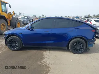 2022 Tesla Model Y Long Range with VIN 7SAYGDEE0NA019067, listed as a IAAI auction lot 41645198 with 49,336 mi miles and . Bid and sale history available at DreamBid. Image 15.