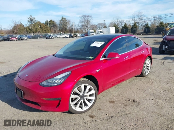2019 Tesla Model 3 Mid Range with VIN 5YJ3E1EA3KF466418, listed as a IAAI auction lot 41724564 with 53,774 mi miles and . Bid and sale history available at DreamBid. Image 17.
