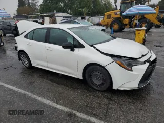 2021 Toyota Corolla LE with VIN 5YFEPMAE6MP252219, listed as a Copart auction lot 47689615 with 124,846 mi miles and Salvage Title. Bid and sale history available at carsss.com. Image 4.