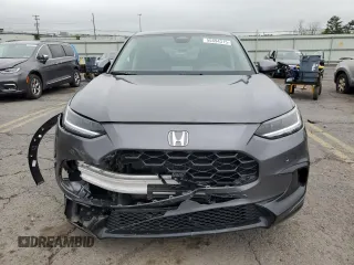 2025 Honda HR-V EX-L z VIN 3CZRZ2H71SM701201, wystawiony jako Copart lot #55594315 z przebiegiem 9 895 mil mil oraz Szkoda całkowita • Salvage title. Historia ofert i sprzedaży dostępna na DreamBid. Obrazek 5.