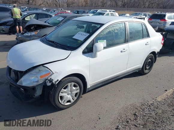 2010 Nissan Versa 1.8 S with VIN 3N1BC1AP8AL465537, listed as a IAAI auction lot 41762115 with 163,533 mi miles and . Bid and sale history available at carsss.com. Image 17.