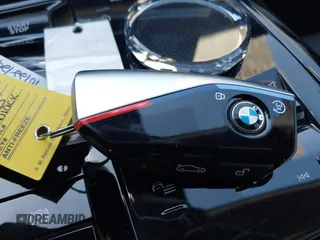 2024 BMW i5 eDrive40 with VIN WBY33FK00RCP37858, listed as a IAAI auction lot 41016747 with Not provided miles and . Bid and sale history available at DreamBid. Image 11.