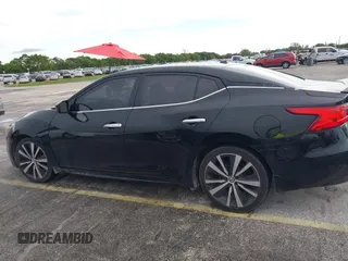 2016 Nissan Maxima SR with VIN 1N4AA6AP9GC428938, listed as a IAAI auction lot 42419663 with 121,501 mi miles and . Bid and sale history available at DreamBid. Image 14.