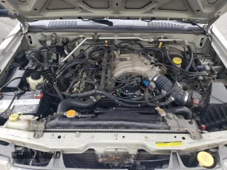 2000 Nissan Frontier XE with VIN 1N6ED27T8YC357939, listed as a Copart auction lot 55727395 with 143,842 mi miles and Salvage title. Bid and sale history available at DreamBid. Image 11.