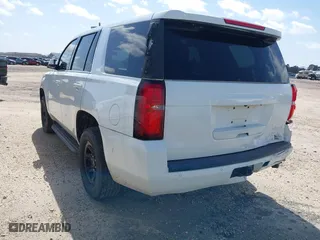 2017 Chevrolet Tahoe Commercial with VIN 1GNLCDEC0HR355599, listed as a IAAI auction lot 41270480 with 181,025 mi miles. Bid and sale history available at carsss.com. Image 3.