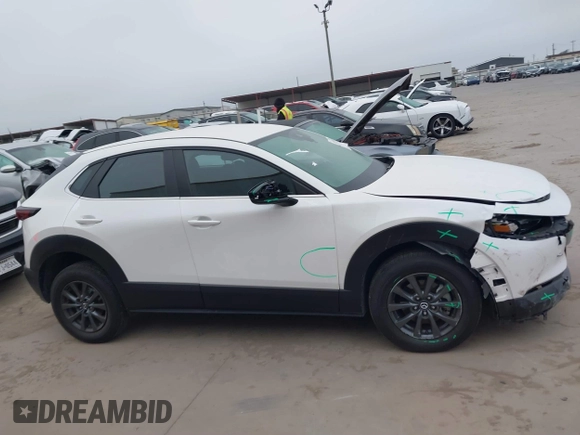 2022 Mazda CX-30 S with VIN 3MVDMBALXNM422418, listed as a IAAI auction lot 41531552 with 21,909 mi miles and . Bid and sale history available at carsss.com. Image 13.