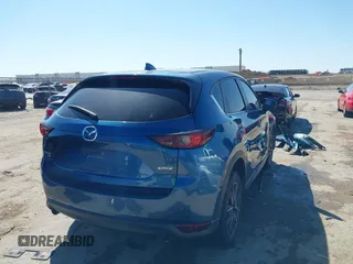 2018 Mazda CX-5 Touring with VIN JM3KFBCM0J0302916, listed as a IAAI auction lot 41837733 with 100,765 mi miles. Bid and sale history available at carsss.com. Image 4.