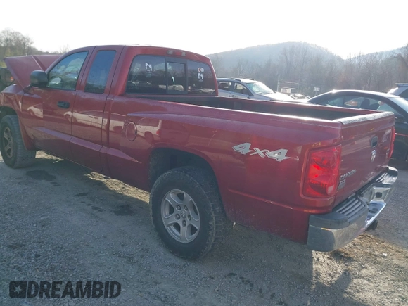 2006 Dodge Dakota SLT with VIN 1D7HW42N16S525329, listed as a IAAI auction lot 40920101 with 124,535 mi miles and . Bid and sale history available at carsss.com. Image 3.