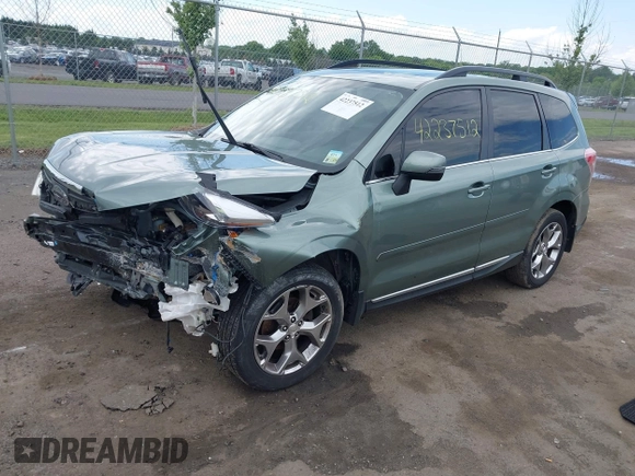2015 Subaru Forester Touring with VIN JF2SJAWC9FH561581, listed as a IAAI auction lot 42237512 with 109,210 mi miles and . Bid and sale history available at DreamBid. Image 2.