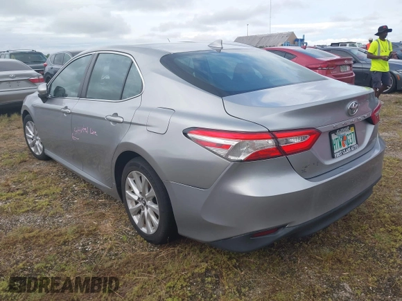 2020 Toyota Camry LE with VIN 4T1C11AK8LU939793, listed as a IAAI auction lot 40523304 with Not Provided miles and . Bid and sale history available at DreamBid. Image 3.