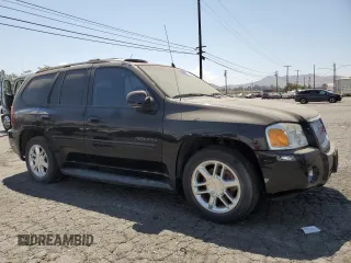 2006 GMC Envoy Denali with VIN 1GKES63M462142564, listed as a Copart auction lot 62684364 with 141,369 mi miles and Clean Title. Bid and sale history available at carsss.com. Image 4.