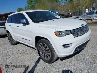 2017 Jeep Grand Cherokee Overland z VIN 1C4RJECG2HC762007, wystawiony jako IAAI lot #41845048 z przebiegiem 80 285 mil mil oraz . Historia ofert i sprzedaży dostępna na DreamBid. Obrazek 1.
