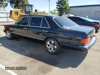 1990 Mercedes-Benz 420 with VIN WDBCA35E6LA549912, listed as a Copart auction lot 69108464 with 302,188 mi miles and Salvage Title. Bid and sale history available at carsss.com. Image 2.